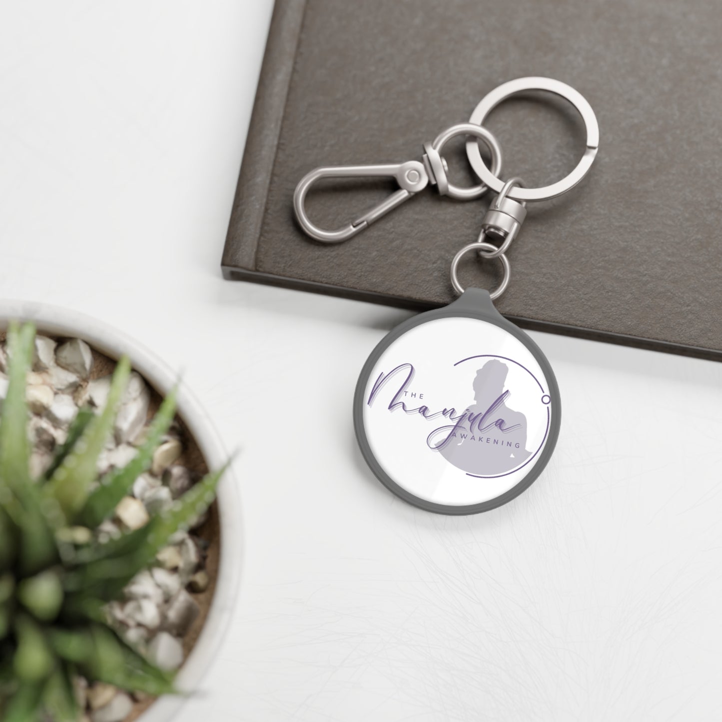 The Manjula Awakening Keyring Tag